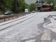 Una violenta grandinata imbianca le strade di Limone Piemonte