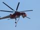 Ampio incendio sopra Dronero. Avviati lanci d'acqua aerei, un soccorritore ferito