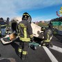 FOTO. Auto si ribalta dopo lo scontro in Autolaghi allo svincolo di Solbiate Arno-Albizzate
