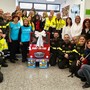 Niente carbone, ma tanti sorrisi per i piccoli pazienti del Regina Margherita: è arrivata la Befana dei Pompieri