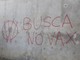 &quot;I vaccini uccidono&quot;: scritte no-vax sul muro del cimitero di Busca