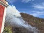 Incendio nei boschi sopra Laveno Mombello, in azione anche l'elicottero dei vigili del fuoco Incendio nei boschi sopra Laveno Mombello, in azione anche l'elicottero dei vigili del fuoco