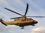 Scontro tra un'auto e una moto sulla Provinciale a Laveno: in volo l'elisoccorso